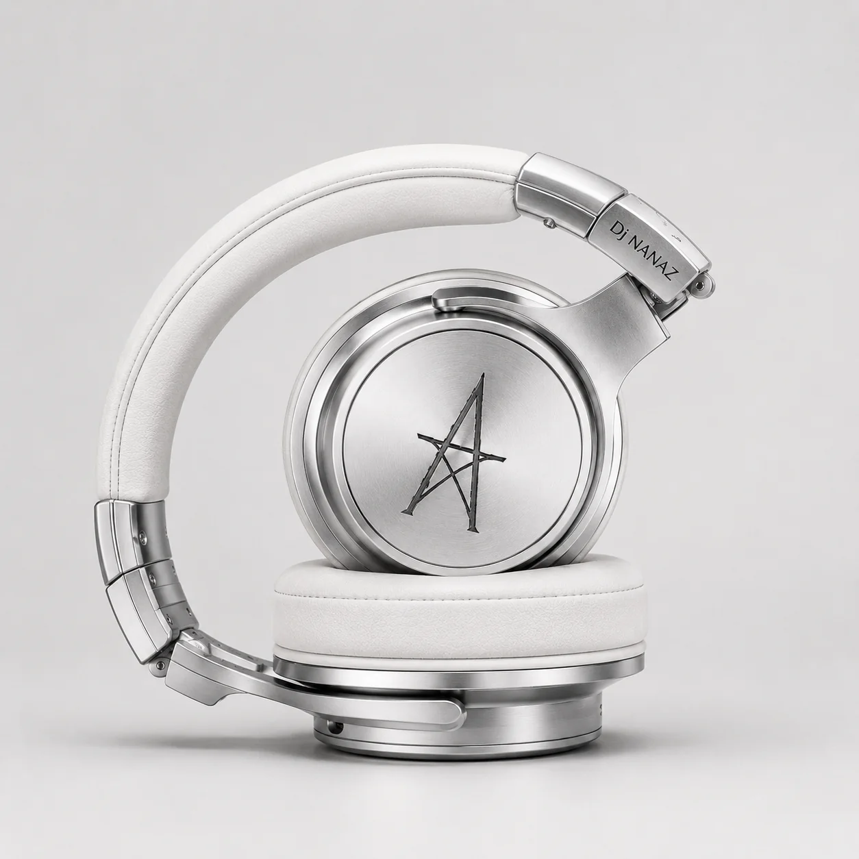 White DJ Nanaz headphones folded
